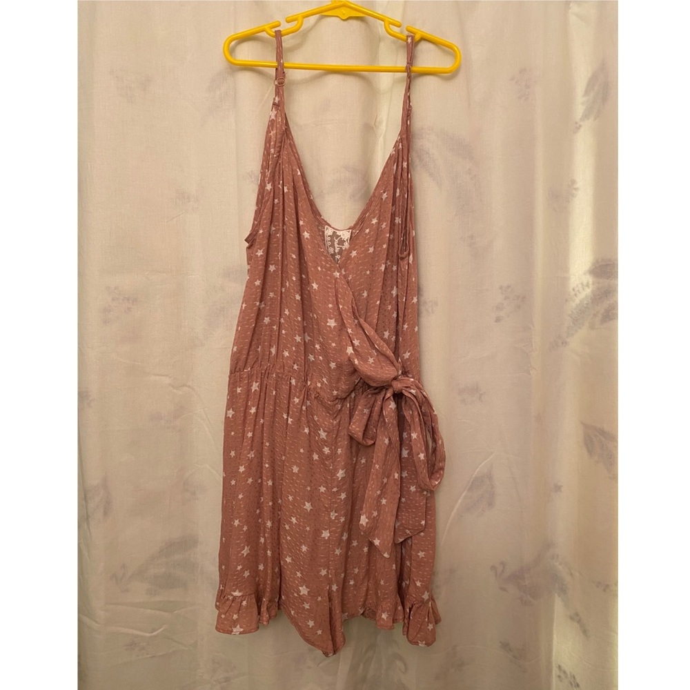 Light pink romper with star pattern